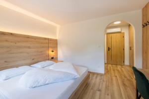 Voodi või voodid majutusasutuse Gasthof Goldenes Lamm toas