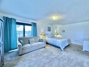 Ένα ή περισσότερα κρεβάτια σε δωμάτιο στο Ocean Breeze 204E +25 φωτογραφίες