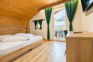 Voodi või voodid majutusasutuse Gasthof Goldenes Lamm toas