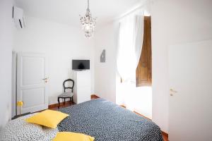 Postel nebo postele na pokoji v ubytování Residenza Moore