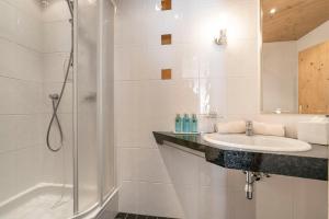 Kúpeľňa v ubytovaní Appartements Aurikel Corso