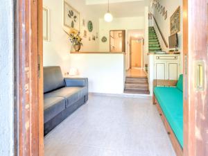 A seating area at Holiday Home in Punta Ala by the Sea