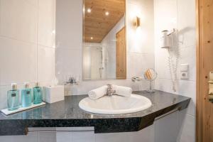 Kúpeľňa v ubytovaní Appartements Aurikel Corso