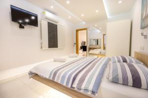 Postel nebo postele na pokoji v ubytování Luxury Apartment Aria