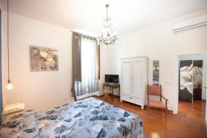 Postel nebo postele na pokoji v ubytování Residenza Moore