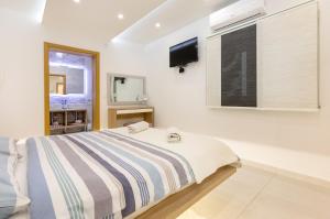 Postel nebo postele na pokoji v ubytování Luxury Apartment Aria