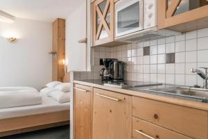 Kuchyňa alebo kuchynka v ubytovaní Appartements Aurikel Corso