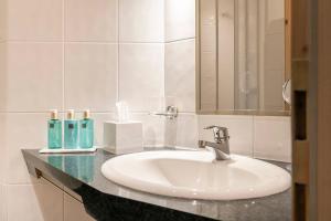 Kúpeľňa v ubytovaní Appartements Aurikel Corso
