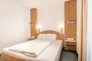 Posteľ alebo postele v izbe v ubytovaní Appartements Aurikel Corso