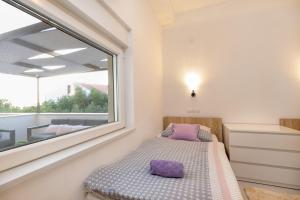 Postel nebo postele na pokoji v ubytování Luxury Apartment Aria