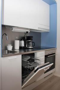 Η κουζίνα ή μικρή κουζίνα στο Lahti City Home 3
