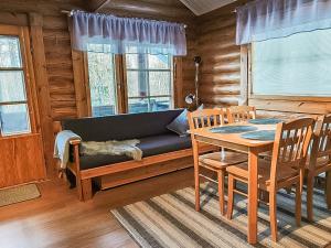 Posezení v ubytování Holiday Home Rustholli 1 by Interhome + 19 fotografií