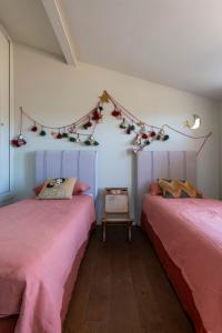 Triplex in an Hôtel Particulier客房内的一张或多张床位