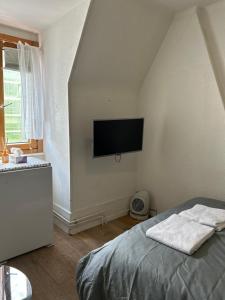 Postel nebo postele na pokoji v ubytování Aparta-Estudio en Voltaplatz