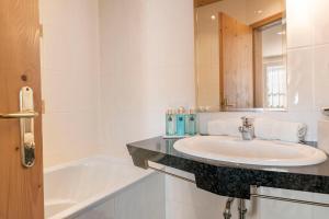 Kúpeľňa v ubytovaní Appartements Aurikel Corso