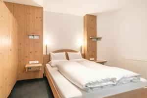 Posteľ alebo postele v izbe v ubytovaní Appartements Aurikel Corso