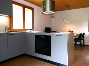 Kuchyň nebo kuchyňský kout v ubytování Holiday Home Rustico Carcarida by Interhome