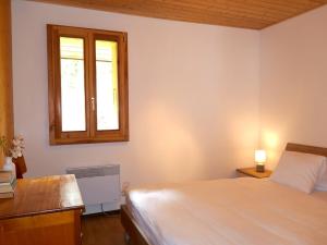 Postel nebo postele na pokoji v ubytování Holiday Home Rustico Carcarida by Interhome + 18 fotografií