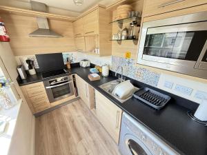 Η κουζίνα ή μικρή κουζίνα στο Lighthouse Apartment