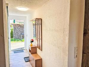 a room with a staircase and a door to a yard at Holiday Home Hammel by Interhome in Ostseebad Koserow