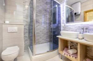 Koupelna v ubytování Luxury Apartment Aria + 32 fotografií