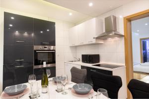 Kuchyň nebo kuchyňský kout v ubytování Luxury Apartment Aria