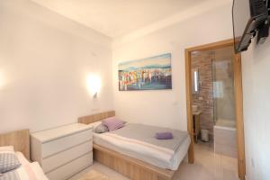 Postel nebo postele na pokoji v ubytování Luxury Apartment Aria