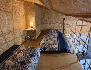Letto o letti in una camera di Gîte chez Arthur