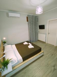 Postel nebo postele na pokoji v ubytování Pietrapantone B&B