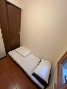 Postel nebo postele na pokoji v ubytování Ciamarra Rooms