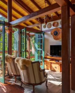 Billede fra billedgalleriet på Jardim Secreto Chalé Azaléia i Nova Friburgo