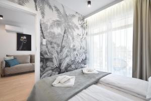 Katil atau katil-katil dalam bilik di Perłowa Przystań Apartament Sealife by LookAp przy plaży, klimatyzacja, parking