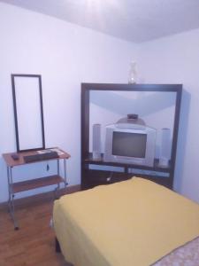 Ένα ή περισσότερα κρεβάτια σε δωμάτιο στο Frama