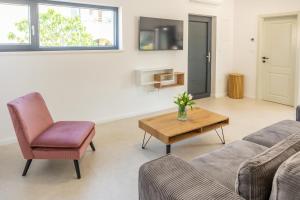 Χώρος καθιστικού στο Apartman Vasianum