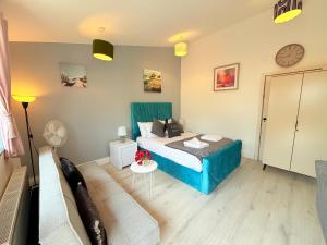 Ένα ή περισσότερα κρεβάτια σε δωμάτιο στο Comfortable Studio Apartment Free Parking