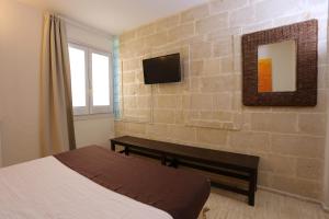 Llit o llits en una habitació de Eco Green La Vigna