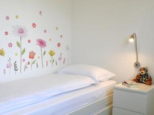 Postel nebo postele na pokoji v ubytování Apartment Ca Jeanne by Interhome