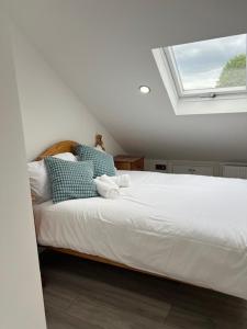 Postel nebo postele na pokoji v ubytování GRAVENEY HOUSE -Sleeps 8 - London Zone 3