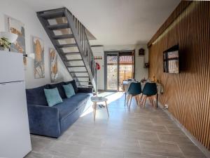 Ruang duduk di Holiday Home Les Maisons de la Plage-13 by Interhome