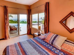 Postel nebo postele na pokoji v ubytování Villas Roma Del Mar + 37 fotografií