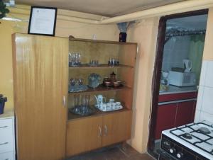 Kuchyňa alebo kuchynka v ubytovaní Tóth Apartman