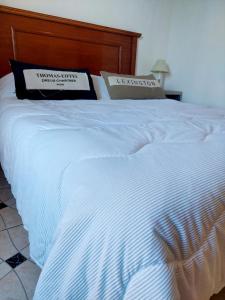 En eller flere senge i et værelse på Temporal Punta Popper