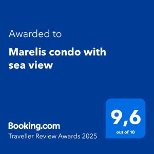 Marelis condo with sea viewに飾ってある許可証、賞状、看板またはその他の書類