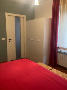Łóżko lub łóżka w pokoju w obiekcie Bed & Breakfast con vista giardino e piscina