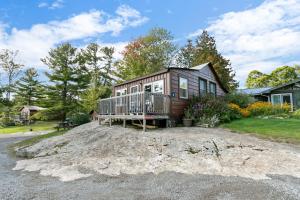 a tiny house sitting on top of a pile of dirt at The Trace at Oak Lake (19+) in Havelock