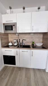 Kuchyňa alebo kuchynka v ubytovaní Apartament GreyAppart