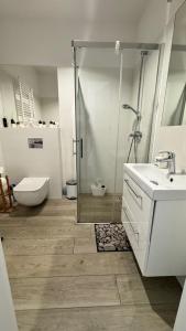 Kúpeľňa v ubytovaní Apartament GreyAppart