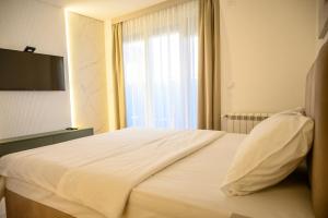 Postel nebo postele na pokoji v ubytování Premium wellness & spa
