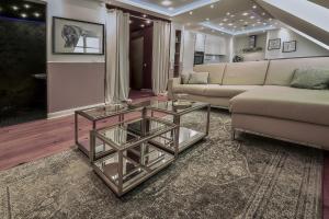 Ein Sitzbereich in der Unterkunft Boutique Suites and Residences Heidelberg- Alte Zigarrenmanufaktur