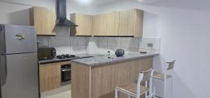 Kuchyň nebo kuchyňský kout v ubytování Residence fedi